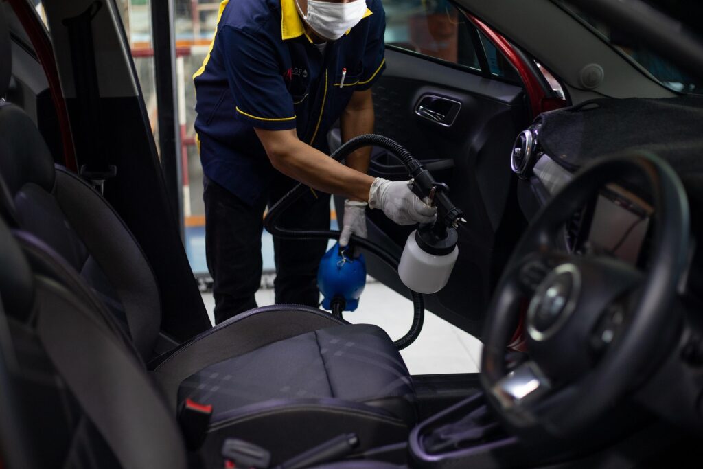 Professional car wash removing dirt and grime from a vehicle’s exterior.